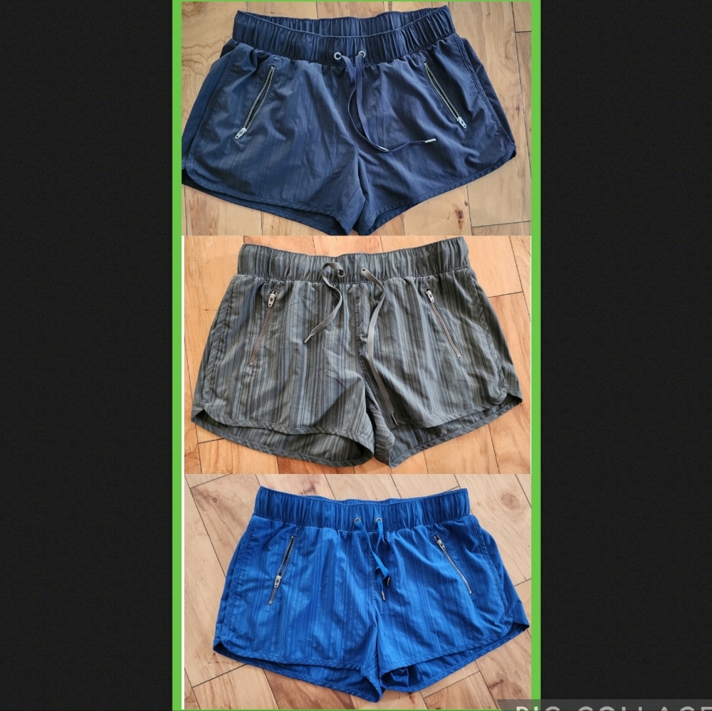 Bundle lot of 3 Athleta pull on shorts with zip pockets. Medium green blue black